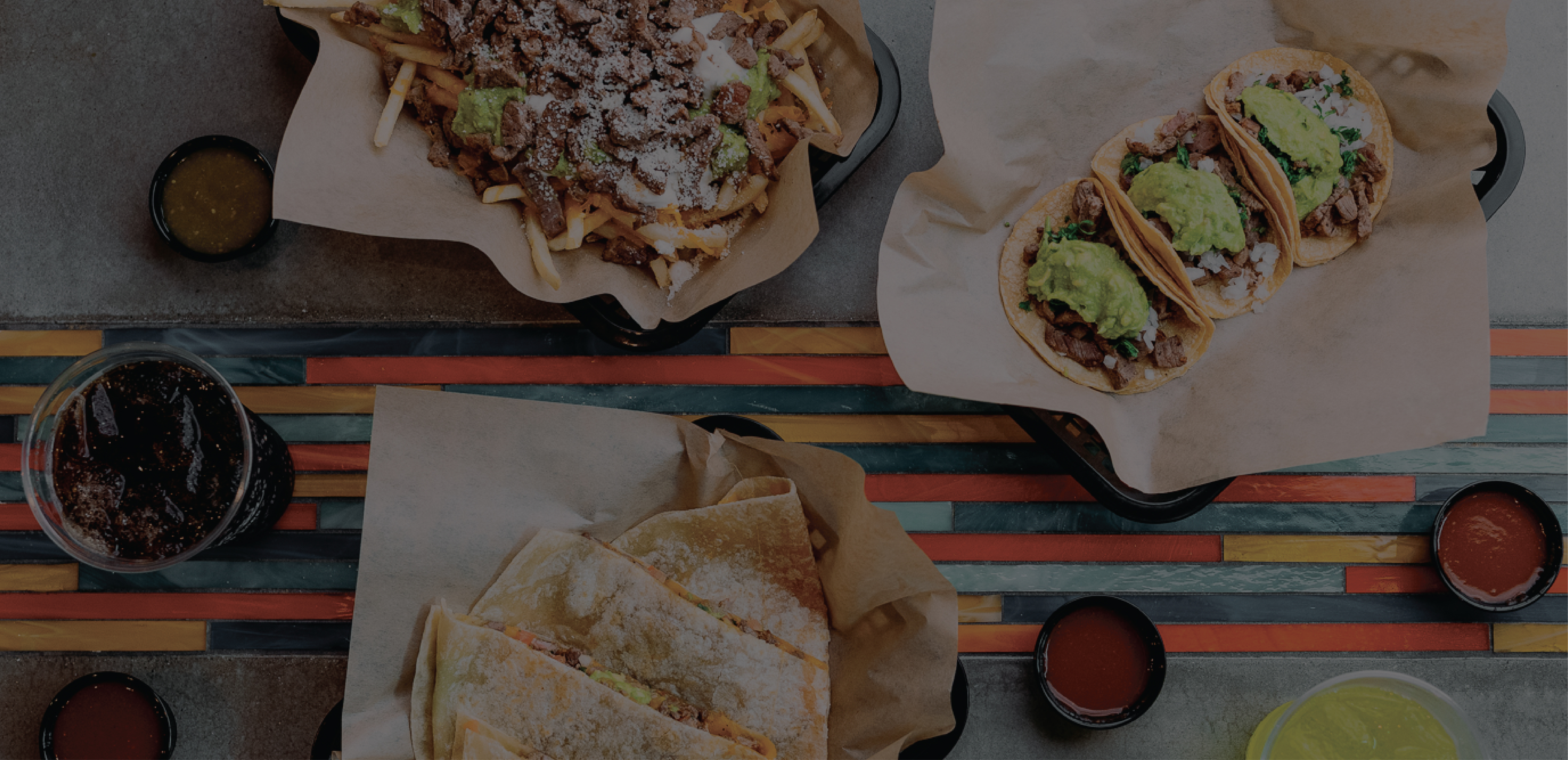 Lolita's Spread. Carne Asada Fries, Super Quesadilla & Mini Tacos